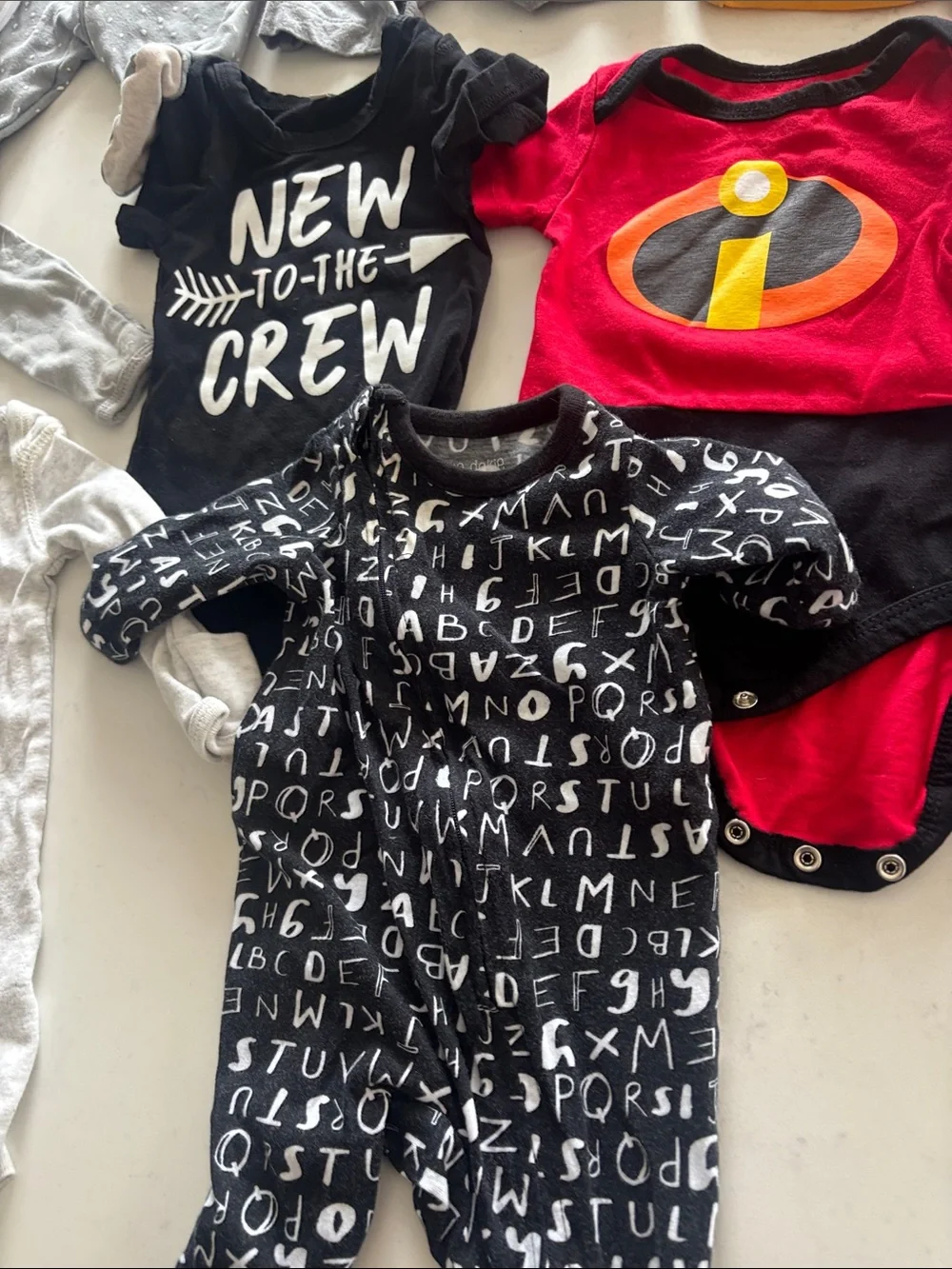 Mixed Baby Onesie & Sleepwear Bundle - Neutral, Yellow, Red newborn